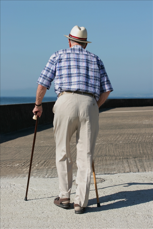 Man_Walking_with_Canes.jpg Man_Walking_with_Canes.jpg